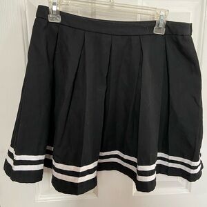Hot Topic Black Pleated Skirt with Bottom White Stripes.